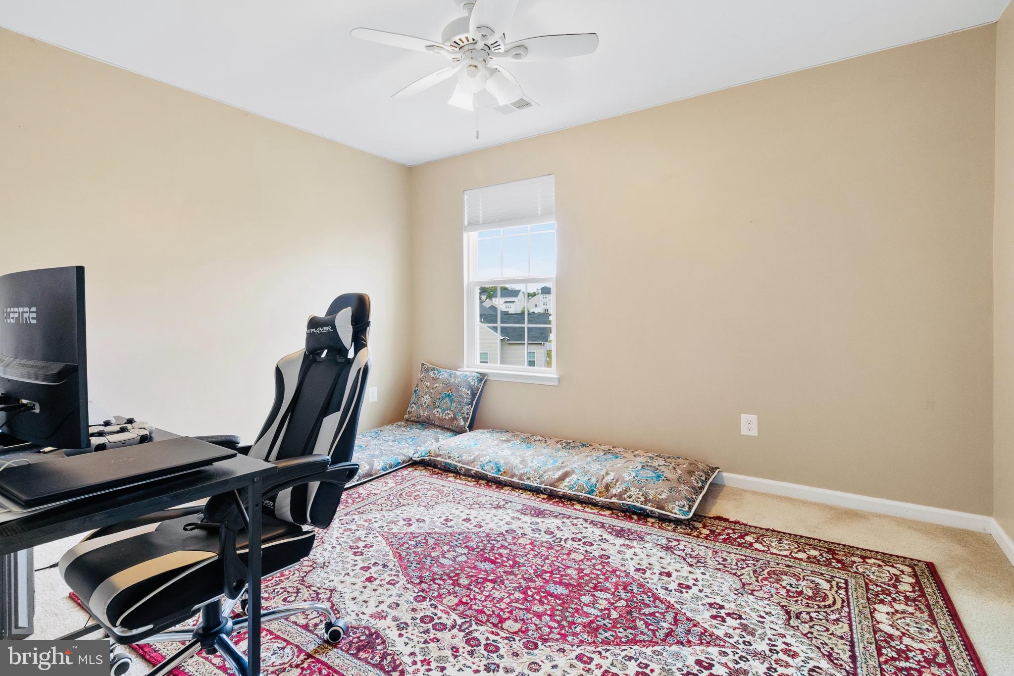3214 Fledgling Circle Woodbridge, VA 22193 - Photo 29 of 30 a view of a workspace with furniture and a window