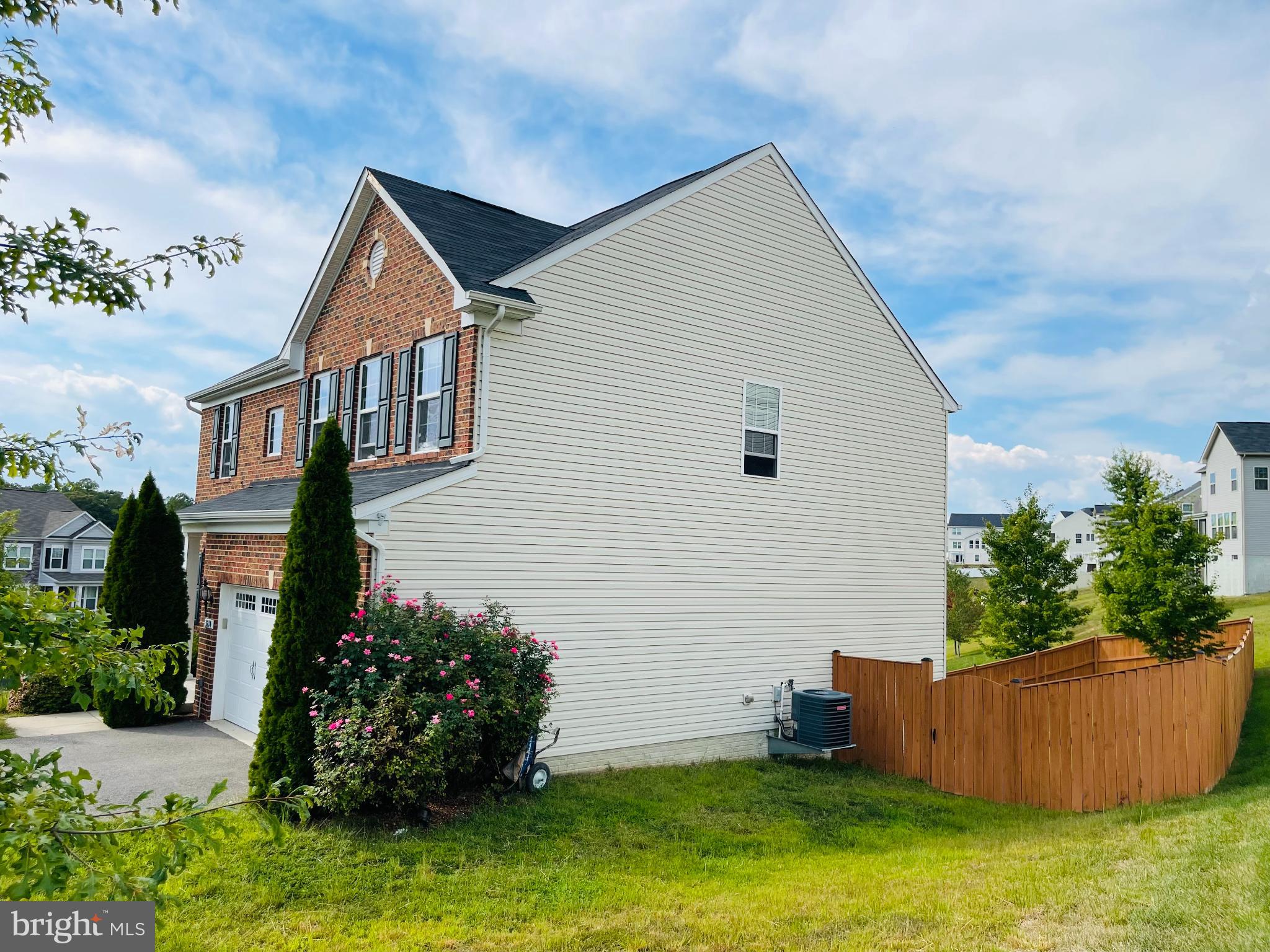 3214 Fledgling Circle Woodbridge, VA 22193 - Photo 4 of 30 front view of house with a yard