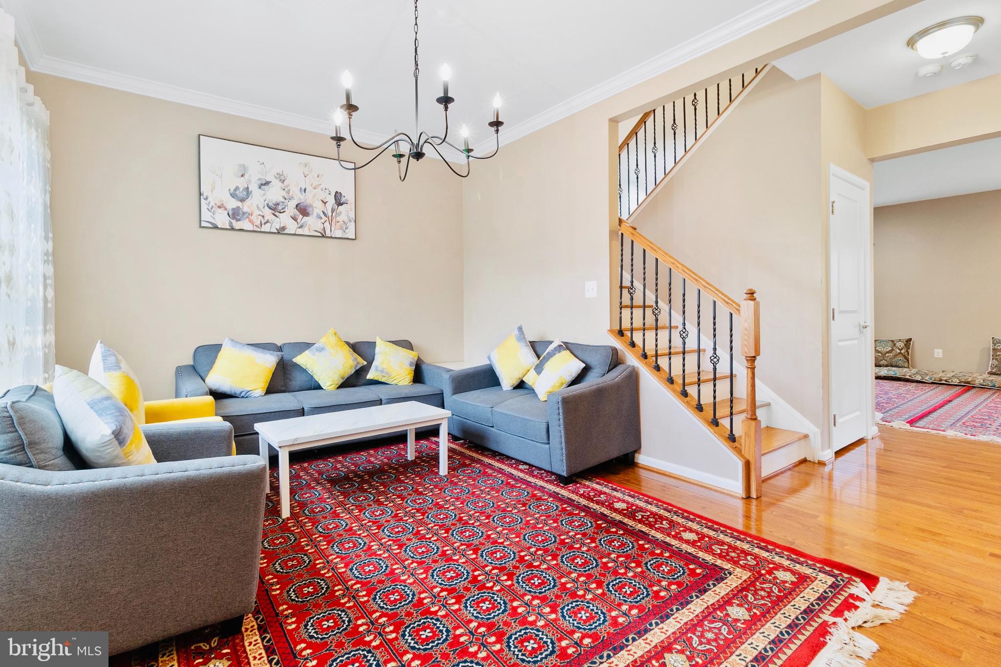 3214 Fledgling Circle Woodbridge, VA 22193 - Photo 8 of 30 a living room with furniture rug and a rug
