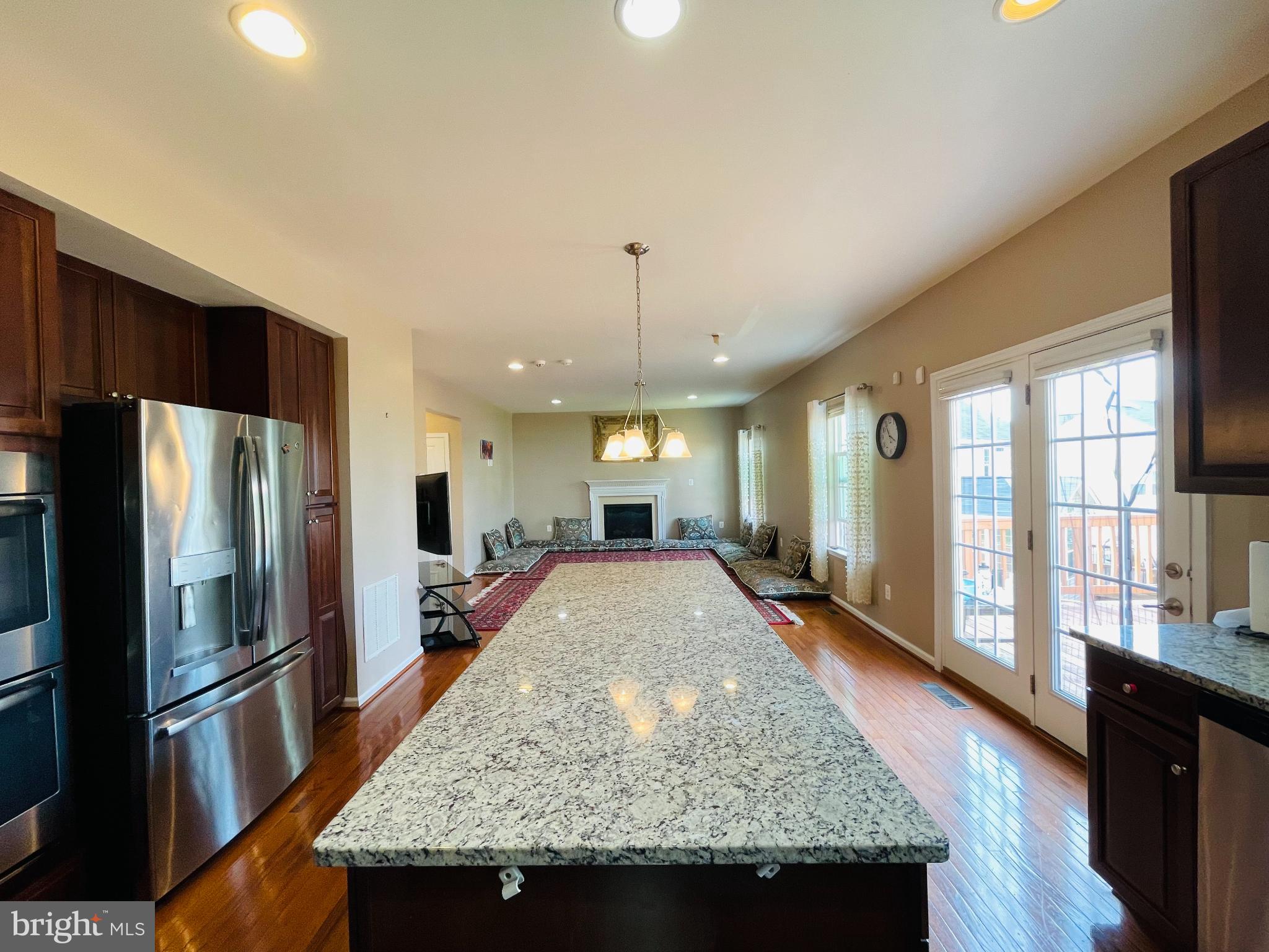 3214 Fledgling Circle Woodbridge, VA 22193 - Photo 10 of 30 a view of kitchen with granite countertop window and refrigerator