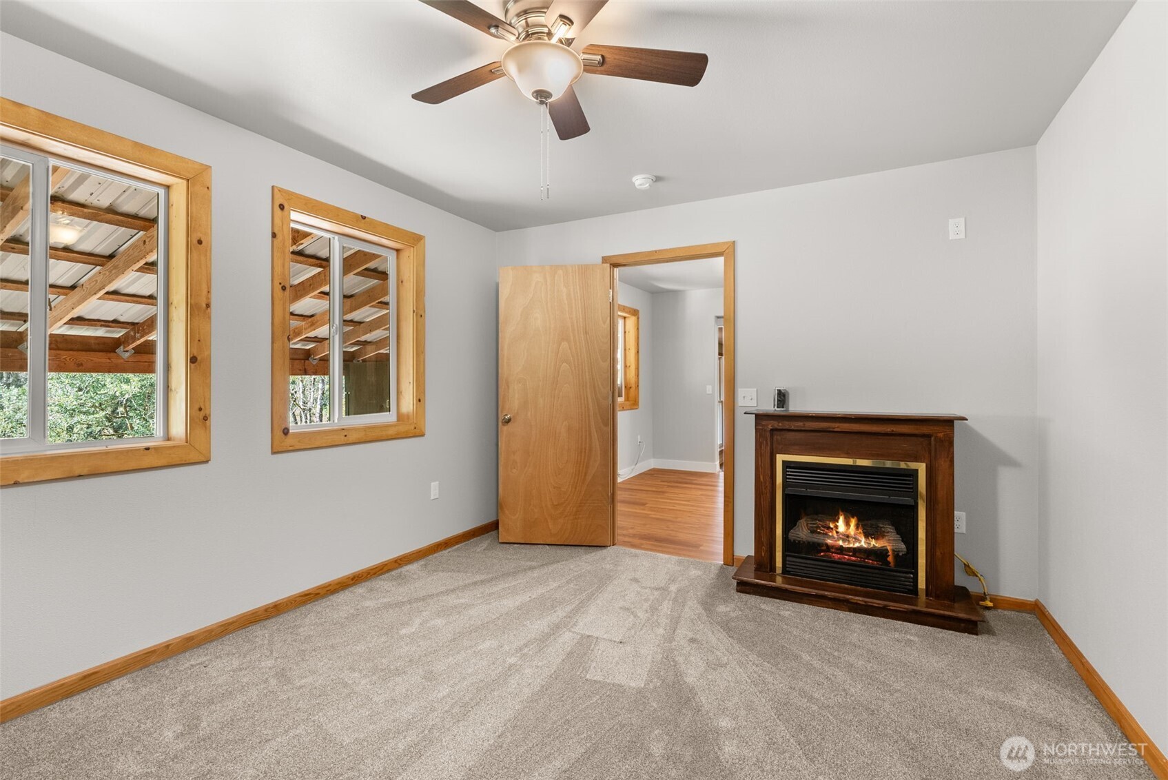 259-10 Tooley Road Toledo, WA 98591 - Photo 17 of 40 a view of an empty room with window and fireplace