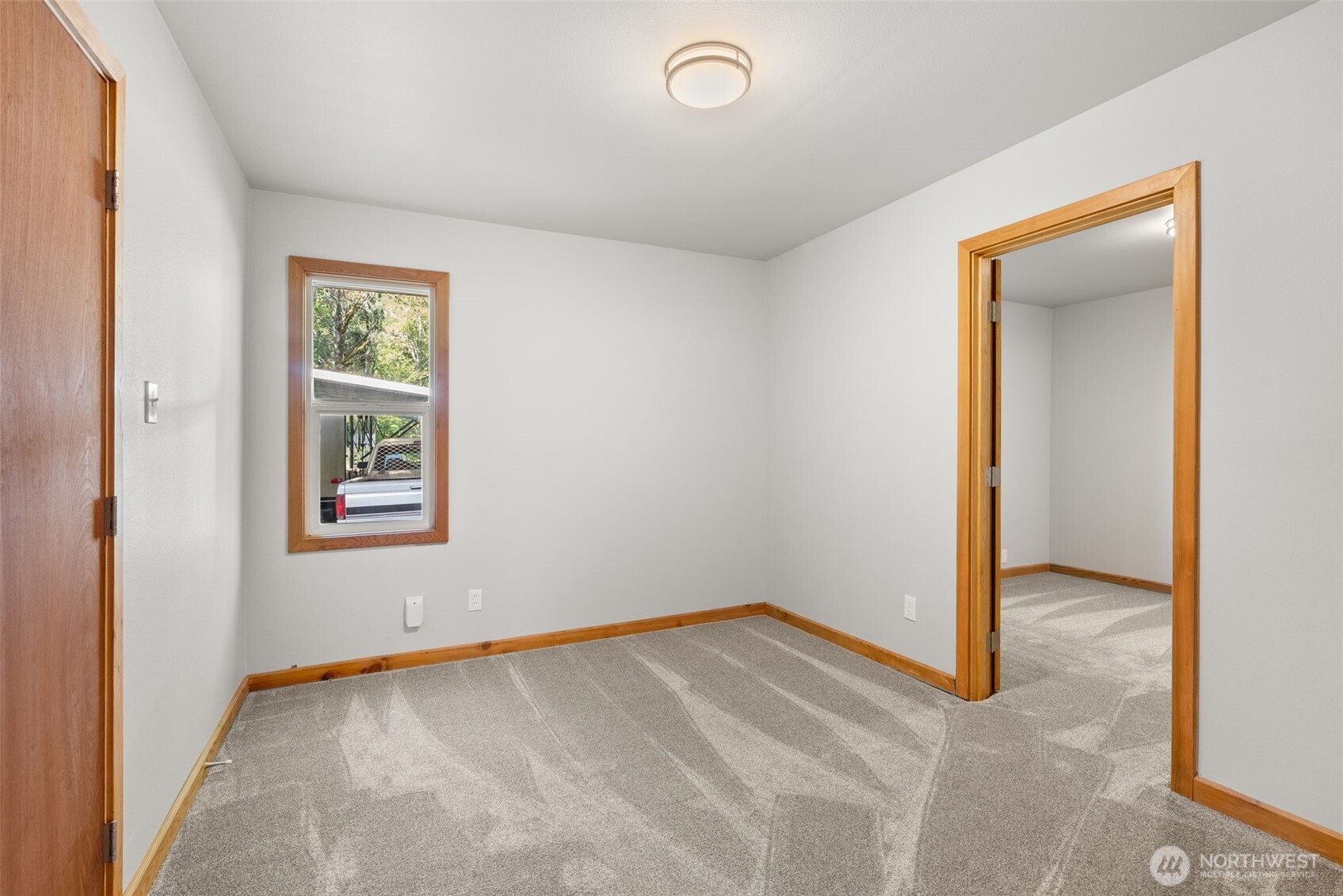 259-10 Tooley Road Toledo, WA 98591 - Photo 21 of 40 an empty room with windows and closet