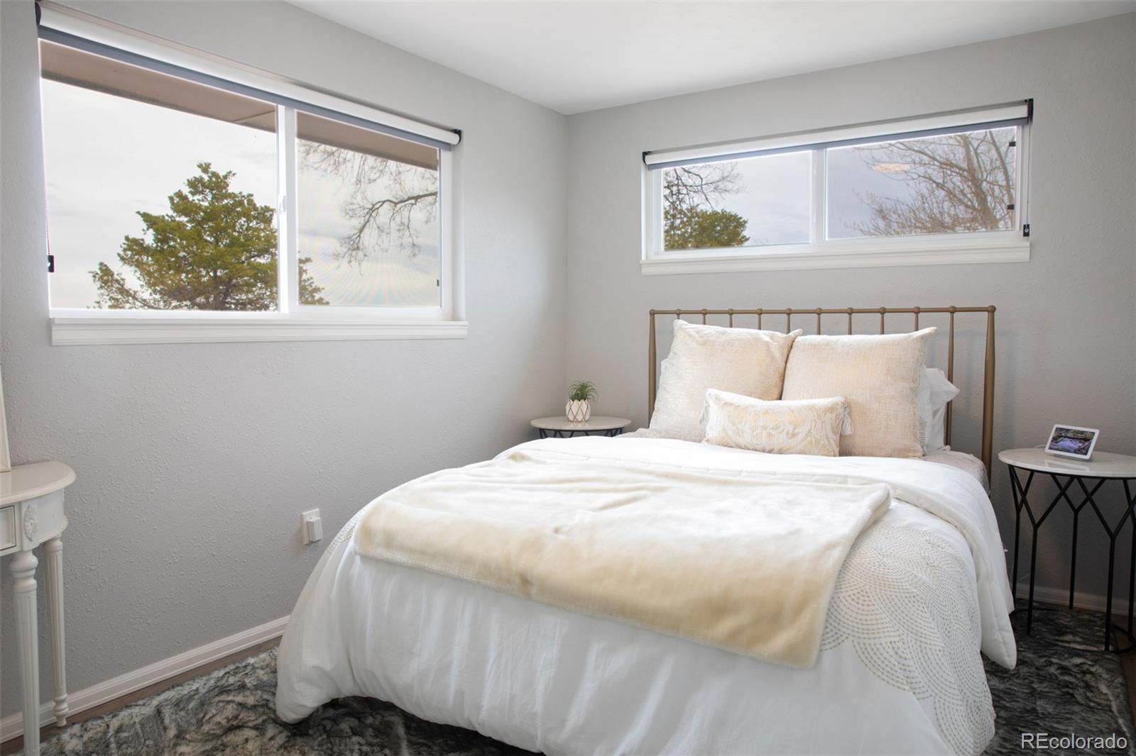 5380 Easley Road Golden, CO 80403 - Photo 18 of 38 a bedroom with a bed and a window