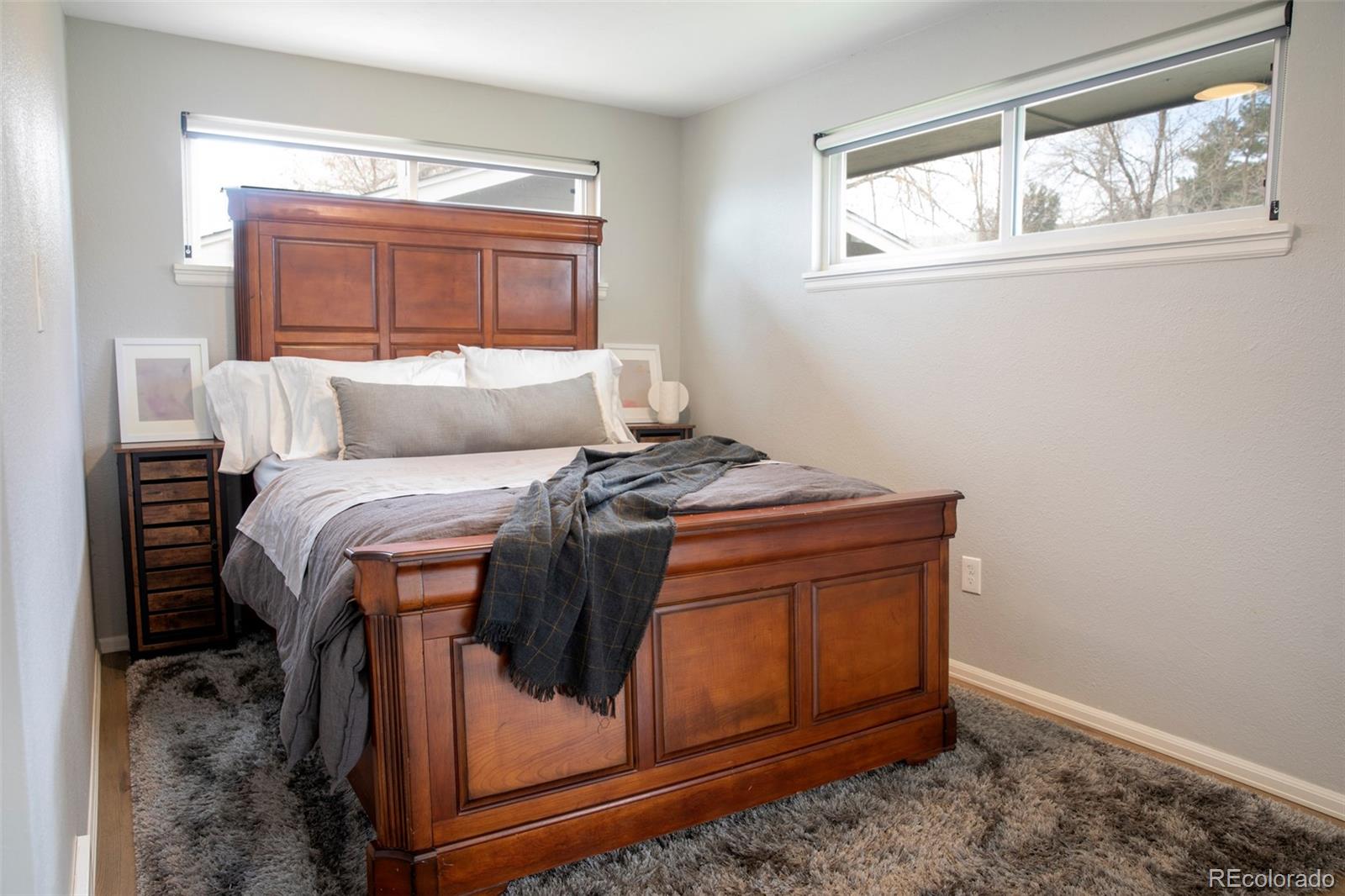 5380 Easley Road Golden, CO 80403 - Photo 19 of 38 a bed sitting in a bedroom next to a window