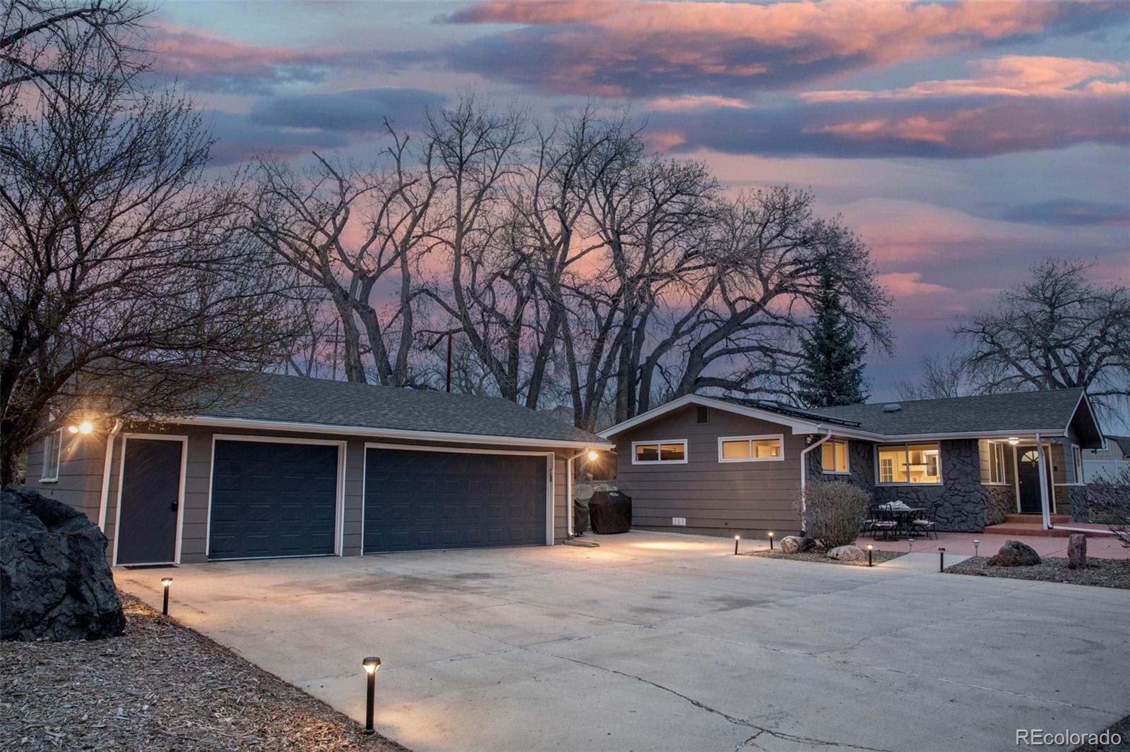 5380 Easley Road Golden, CO 80403 - Photo 33 of 38 a house with trees in the background