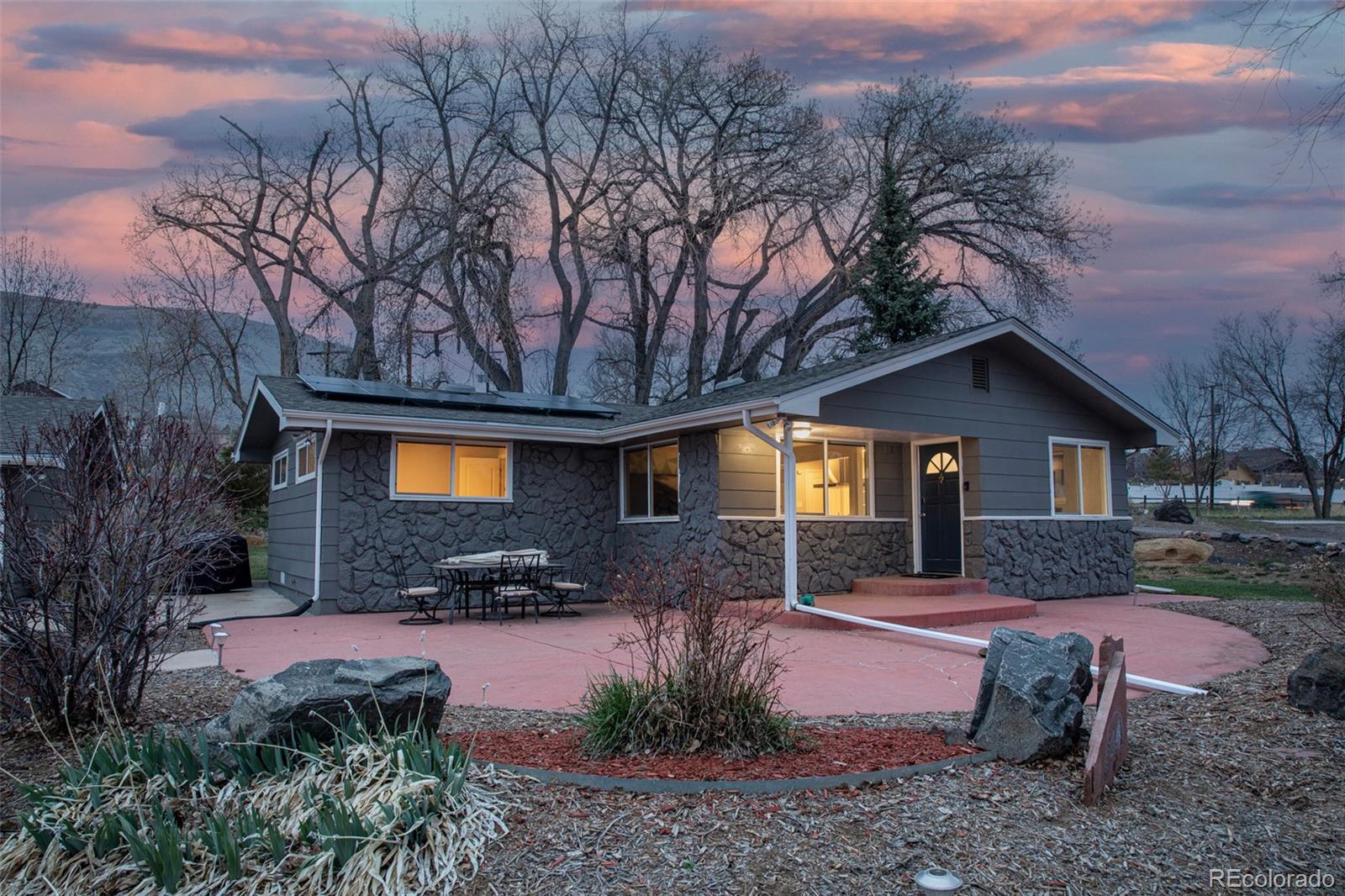 5380 Easley Road Golden, CO 80403 - Photo 34 of 38 a view of a house with a yard covered with snow in the yard