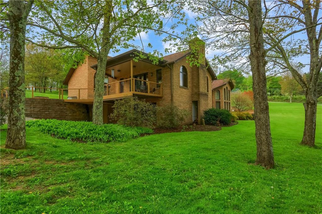 481 Chicora Fenelton Road Chicora, PA 16025 - Photo 47 of 50 a front view of a house with garden