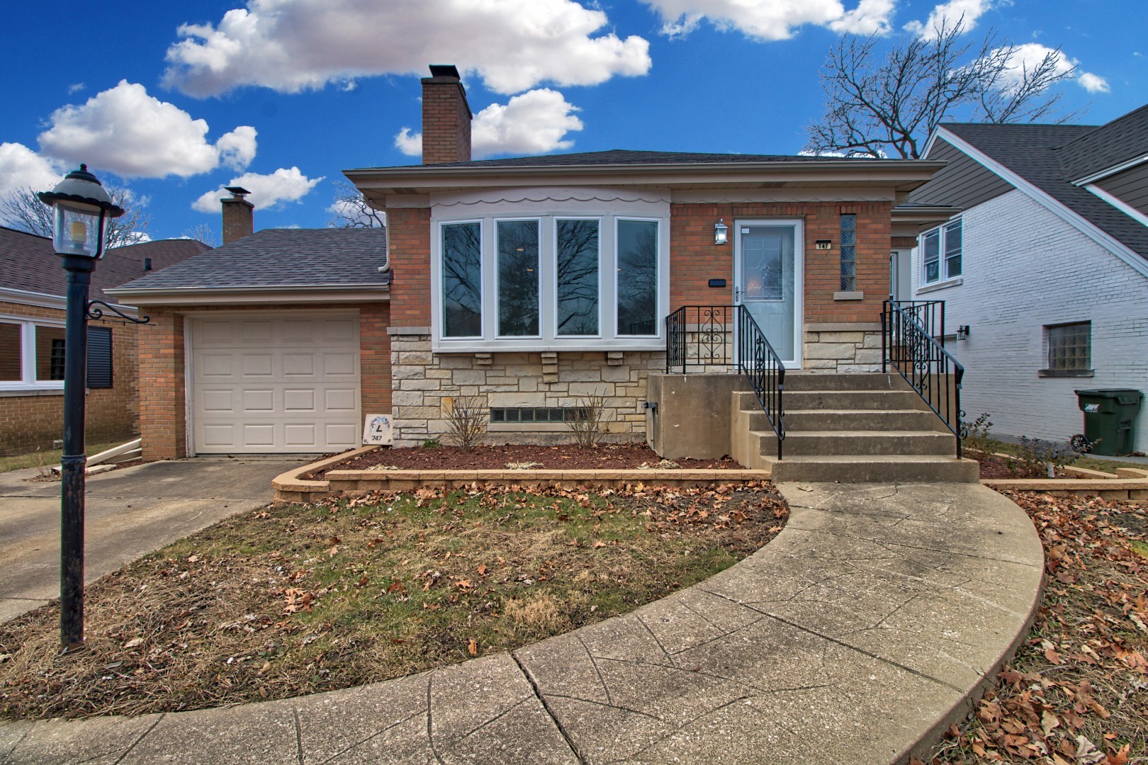 747 Arlington Road Riverside, IL 60546 - Photo 1 of 16 front view of a house with a yard