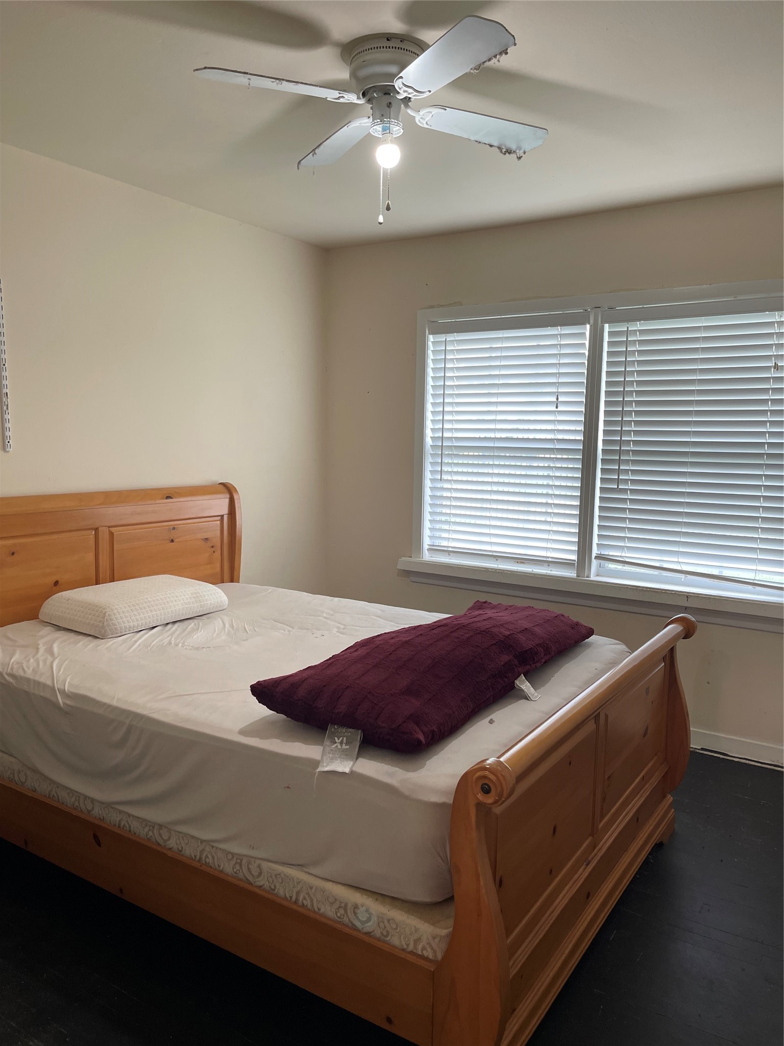 7403 Dearborn Street Houston, TX 77055 - Photo 11 of 14 a bedroom with a bed and window