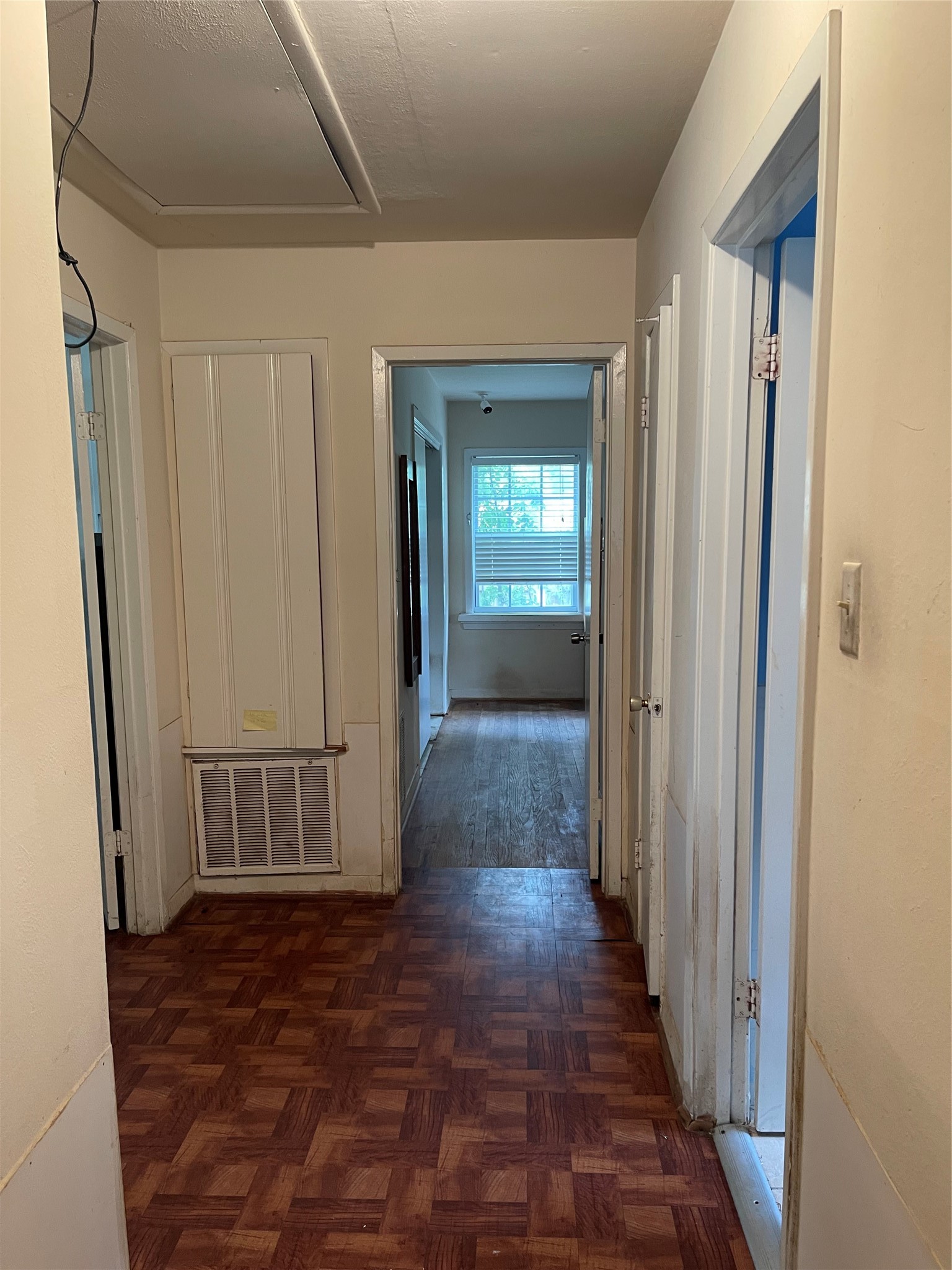 7403 Dearborn Street Houston, TX 77055 - Photo 10 of 14 a view of a hallway with wooden floor and staircase
