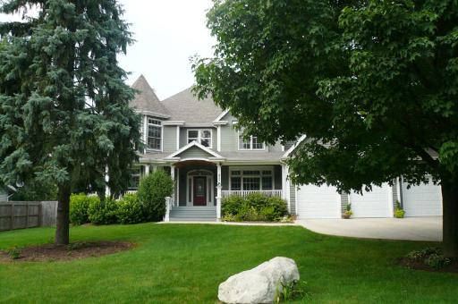 921 Parkside Road Naperville, IL 60540 - Photo 1 of 1 a front view of a house with a yard and trees