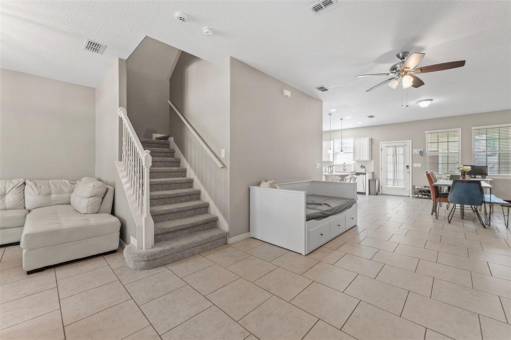 3523 Clay Brick Road St. Cloud, FL 34773 - Photo 10 of 62 a living room with furniture and white walls