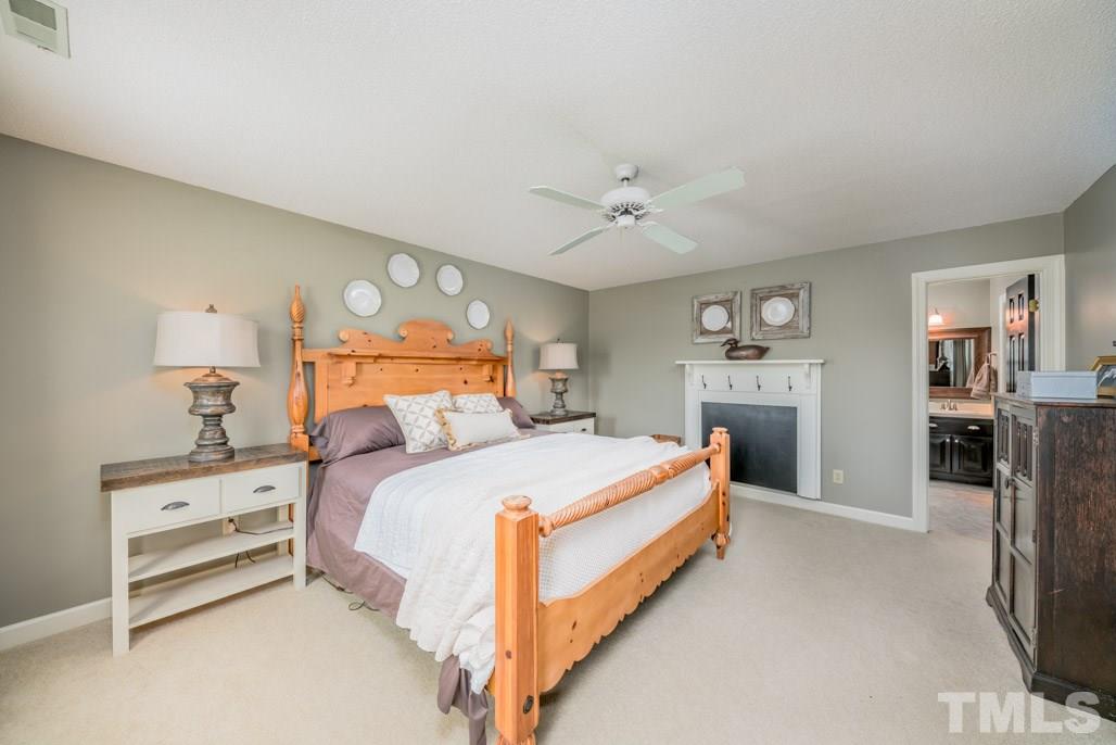6108 Wolverhampton Drive Raleigh, NC 27603 - Photo 20 of 30 a bedroom with a bed and closet