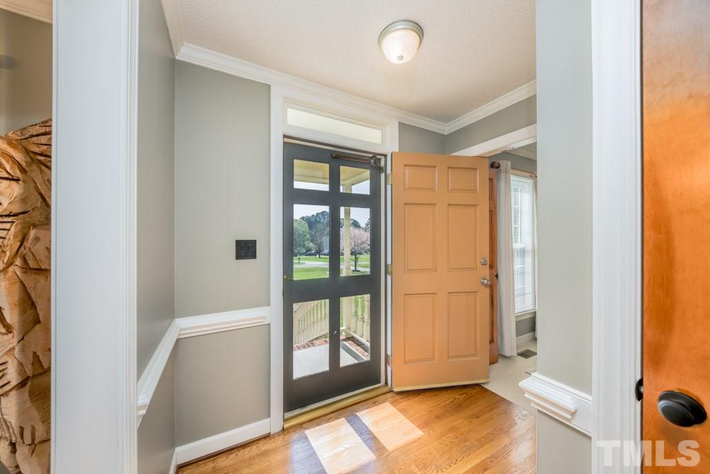 6108 Wolverhampton Drive Raleigh, NC 27603 - Photo 5 of 30 a view of front door