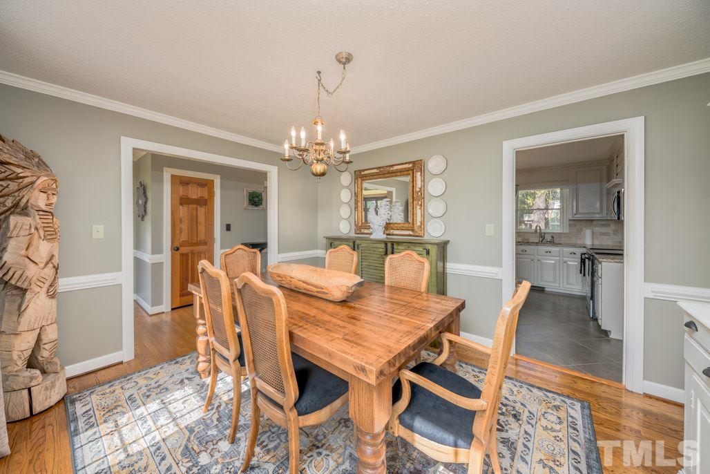 6108 Wolverhampton Drive Raleigh, NC 27603 - Photo 6 of 30 a view of a dining room with furniture