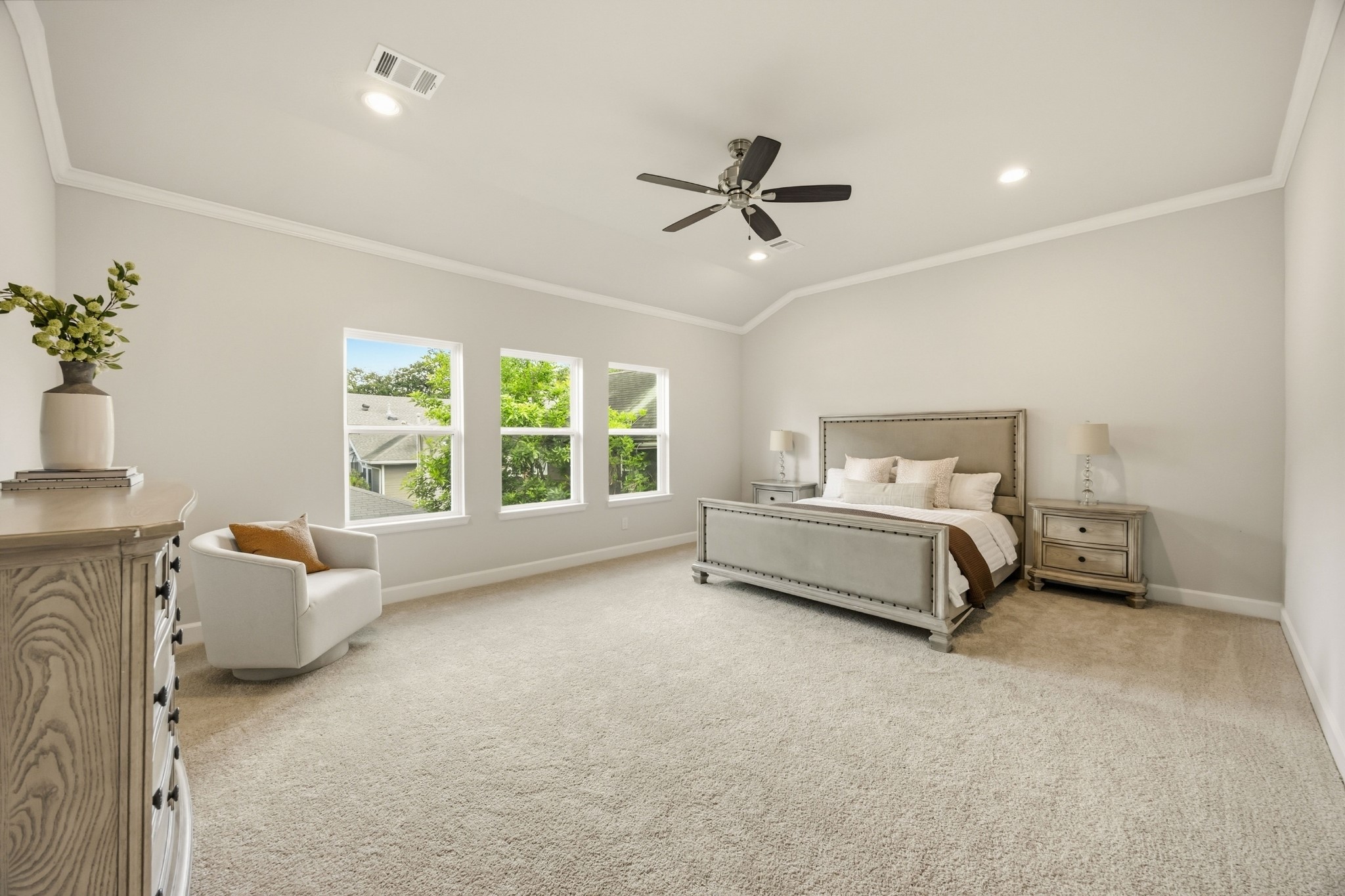 4317 Roseland Street, Unit B Houston, TX 77006 - Photo 16 of 29 A sanctuary of light and luxury; this large, primary bedroom serves as a haven of tranquility and refined comfort.