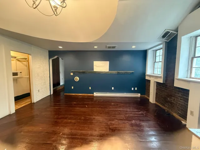 a view of a livingroom with a furniture