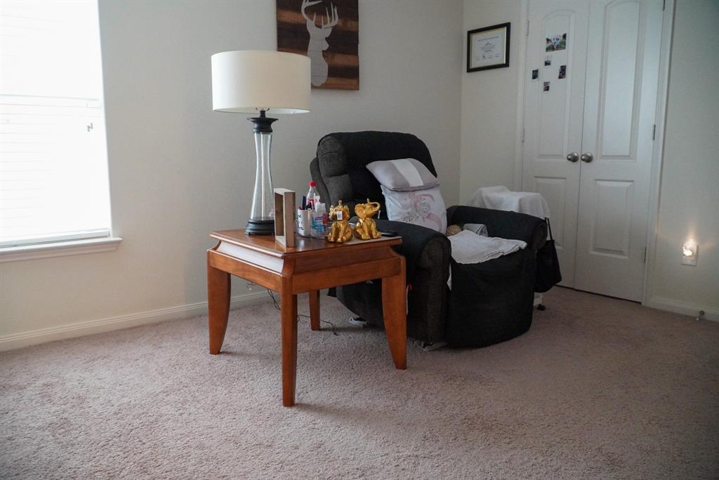 13624 Helix Bridge Way Crowley, TX 76036 - Photo 16 of 25 a room with a table and a chair