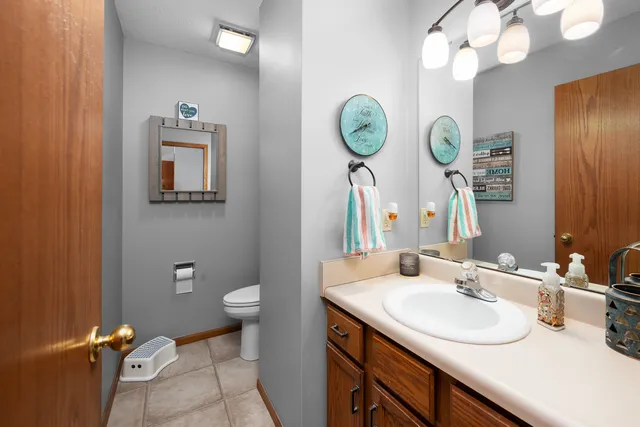 a bedroom with bed and a window