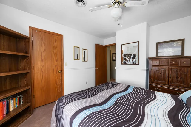 a bathroom with a sink vanity and a mirror