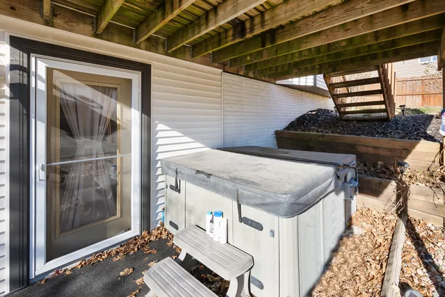 a view of two chairs in the balcony
