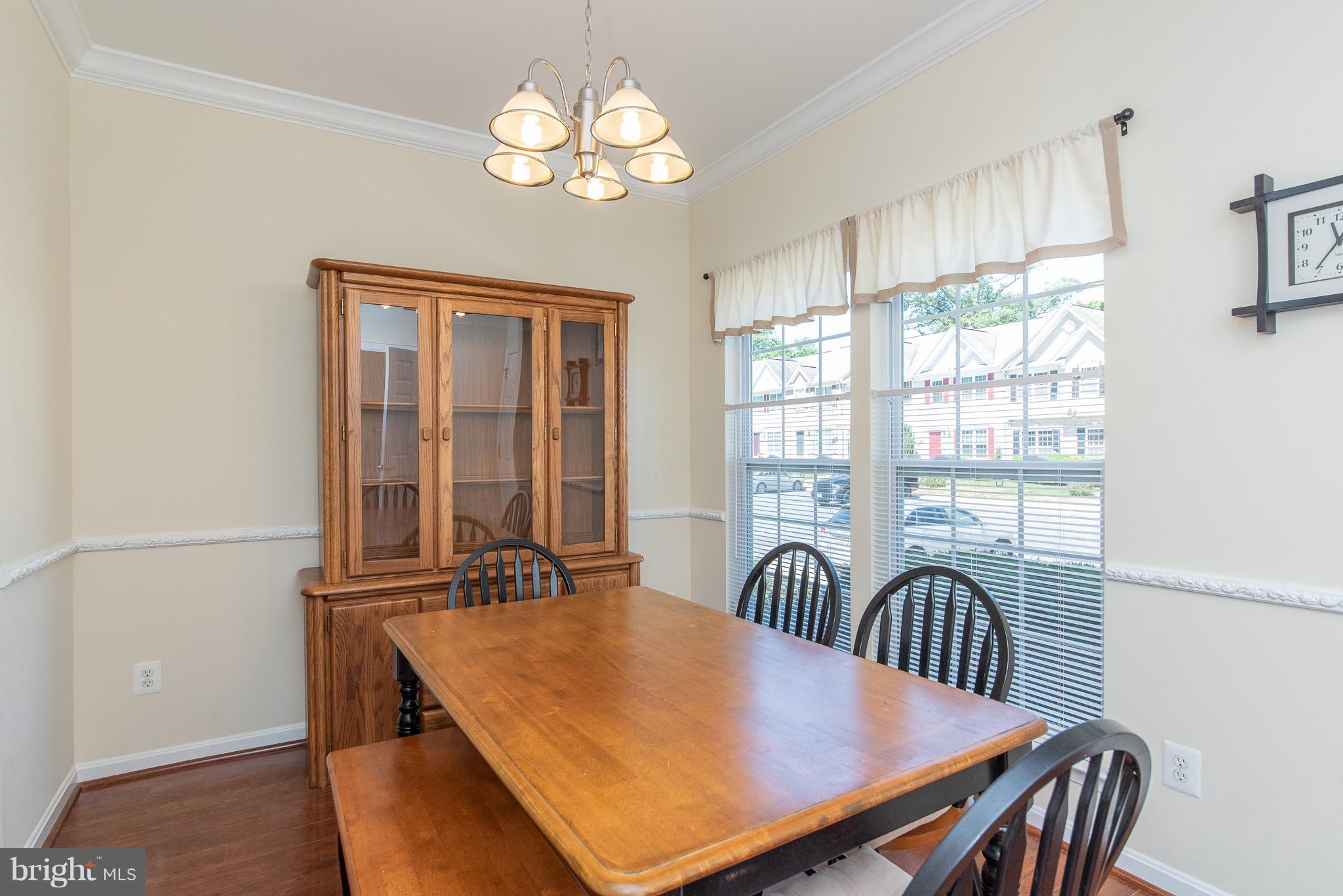 1707 Waltman Road Edgewood, MD 21040 - Photo 4 of 30 a view of a dining room with furniture window and wooden floor