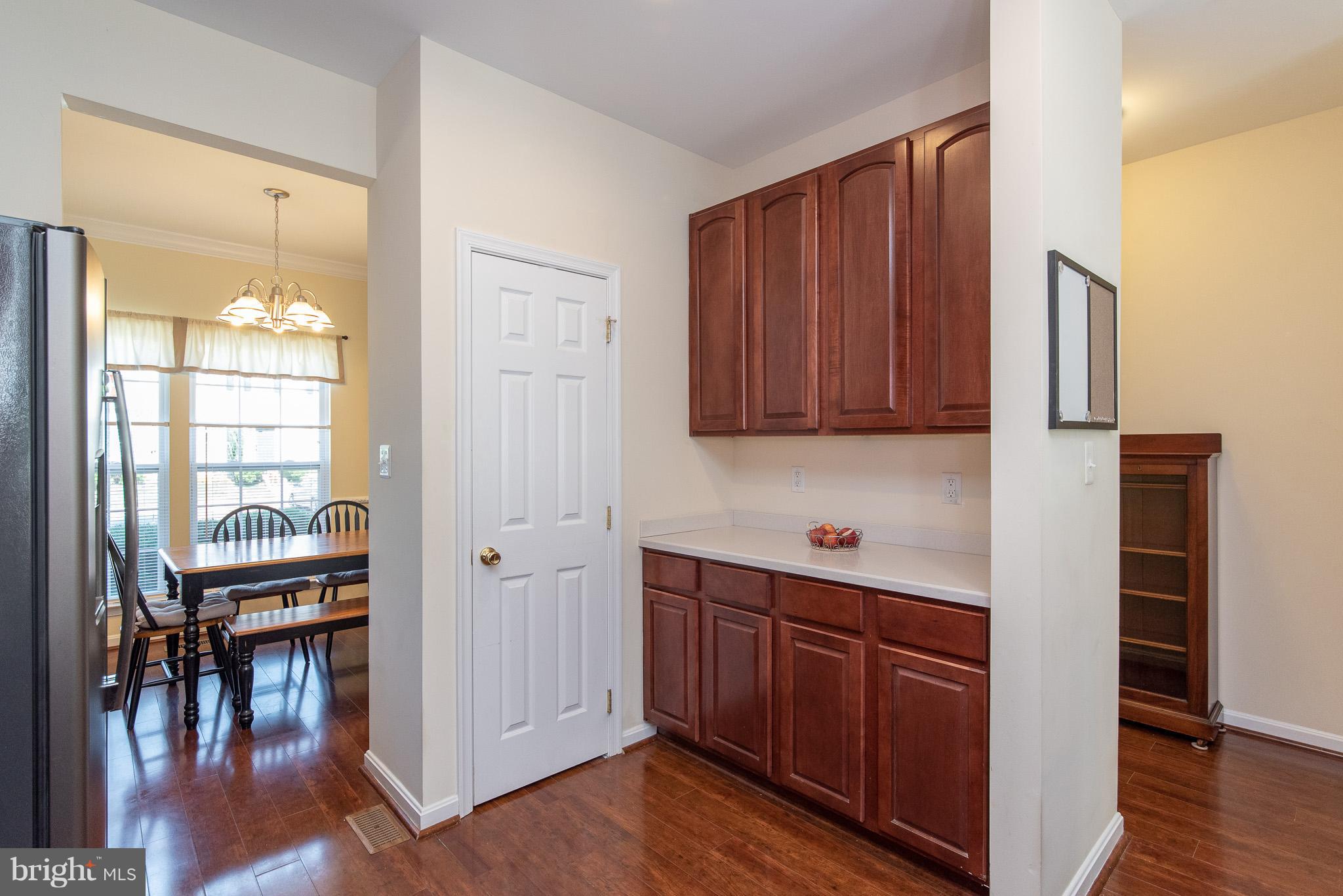 1707 Waltman Road Edgewood, MD 21040 - Photo 8 of 30 a kitchen with wooden cabinets and sink