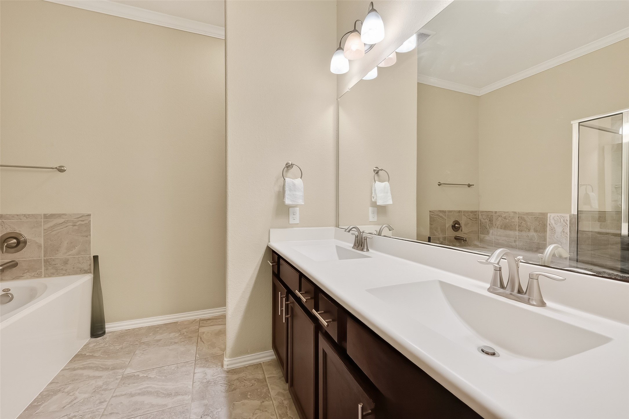 18139 Swallow Springs Way Spring, TX 77379 - Photo 16 of 41 Primary ensuite bath with tub, shower, and double sinks!