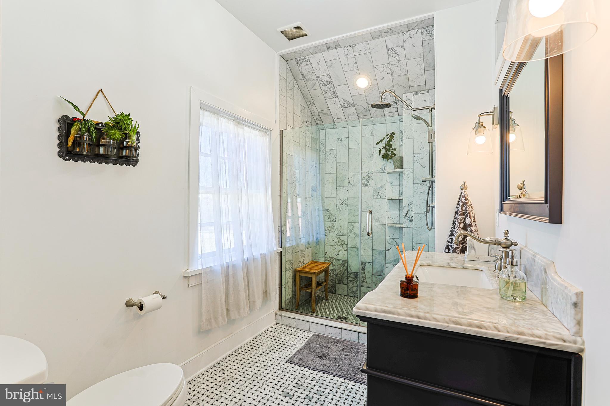 38 Devyn Drive Chester Springs, PA 19425 - Photo 14 of 40 a bathroom with a sink mirror vanity and toilet