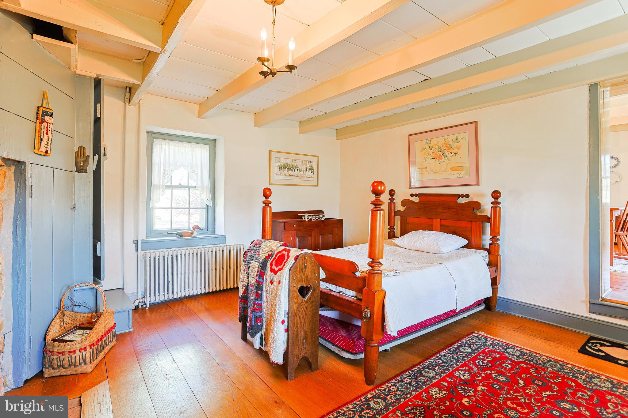 38 Devyn Drive Chester Springs, PA 19425 - Photo 16 of 40 a bedroom with natural light and wooden floor