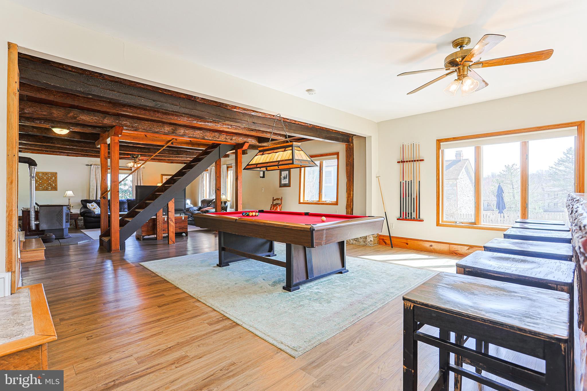 38 Devyn Drive Chester Springs, PA 19425 - Photo 21 of 40 a room with lots of furniture and wooden floors