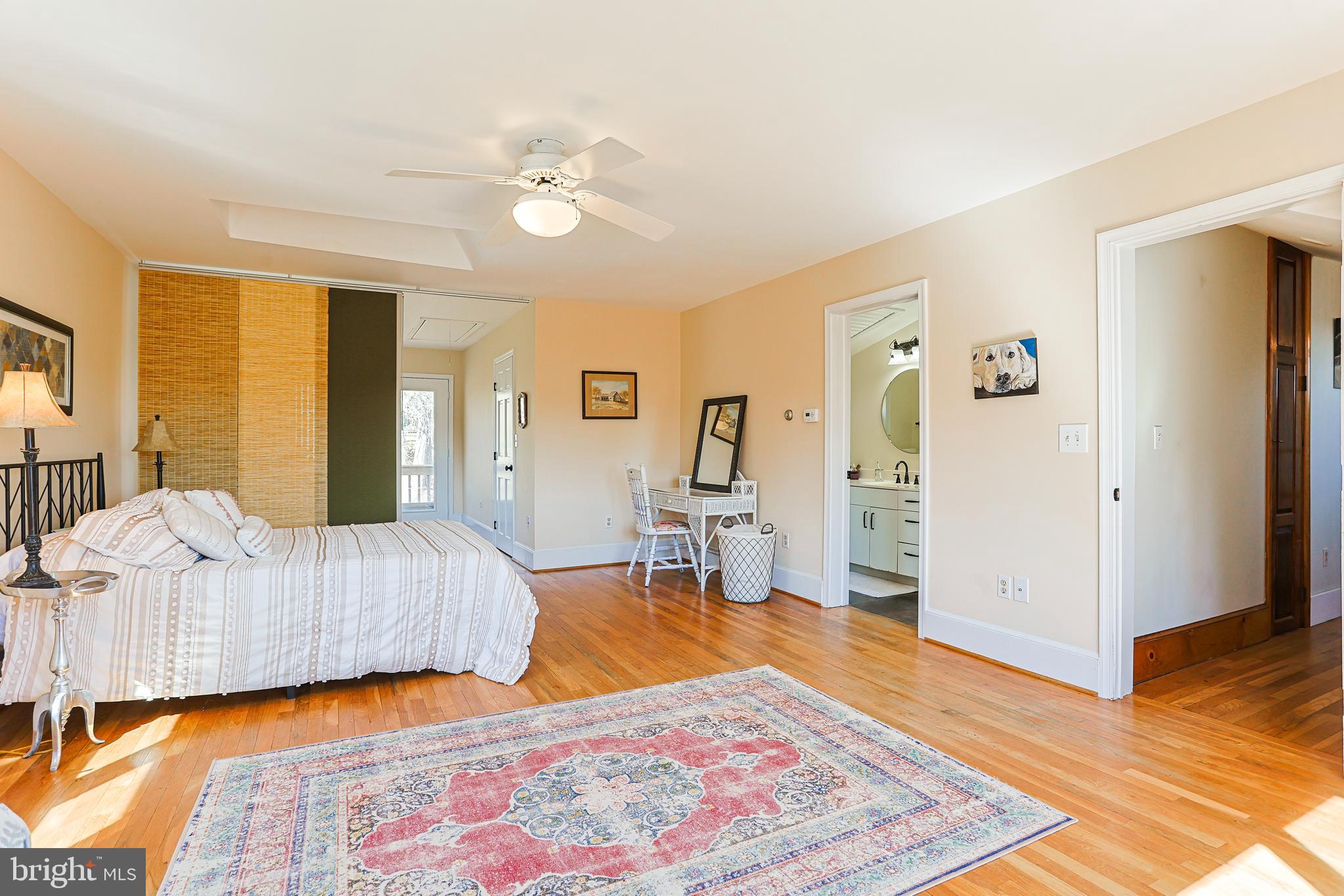 38 Devyn Drive Chester Springs, PA 19425 - Photo 26 of 40 a spacious bedroom with a bed and wooden floor