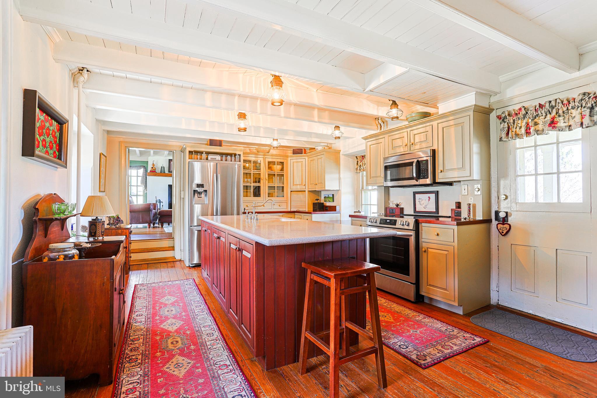 38 Devyn Drive Chester Springs, PA 19425 - Photo 3 of 40 a large kitchen with stainless steel appliances granite countertop a large counter top and a stove