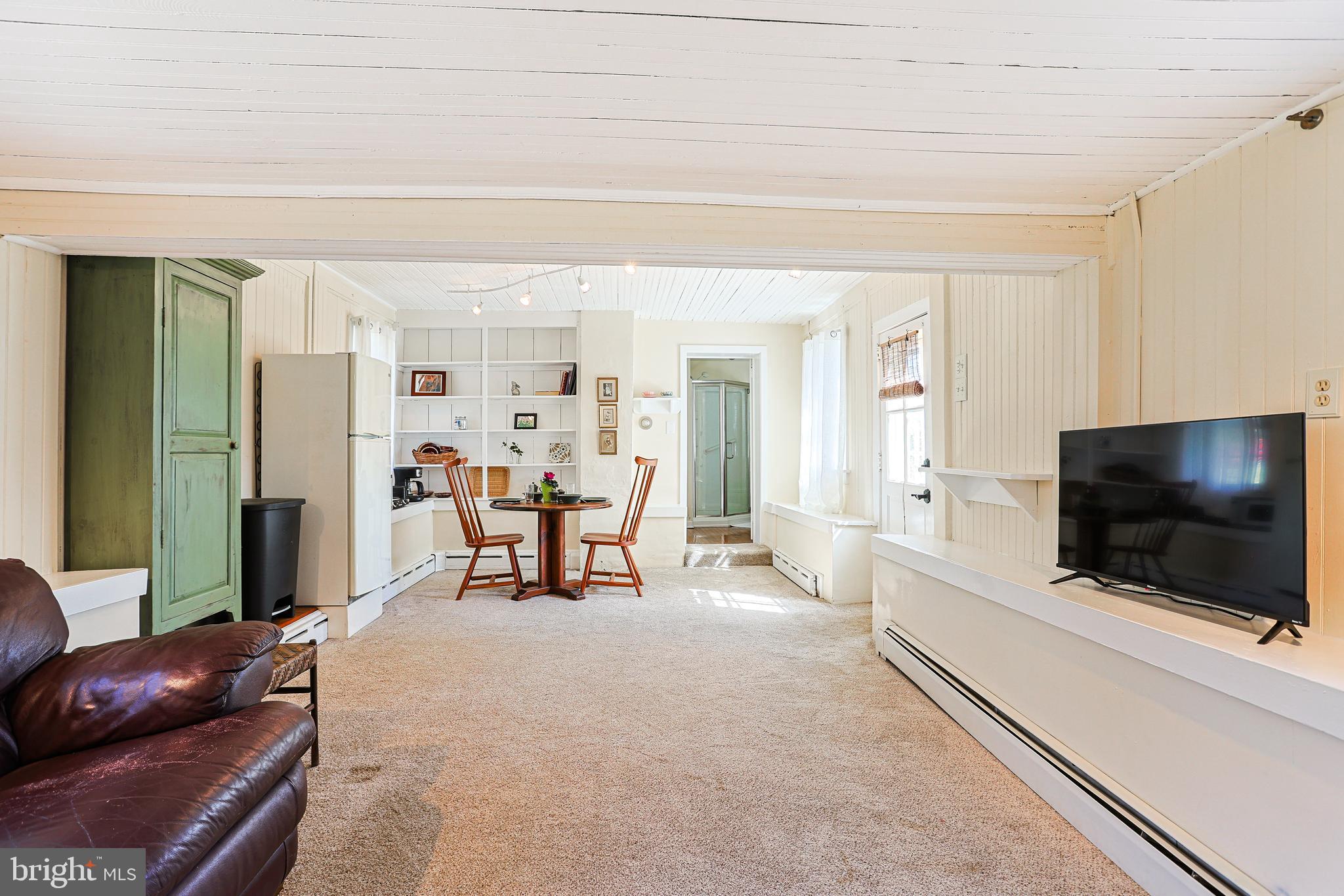 38 Devyn Drive Chester Springs, PA 19425 - Photo 32 of 40 a living room with furniture and a flat screen tv