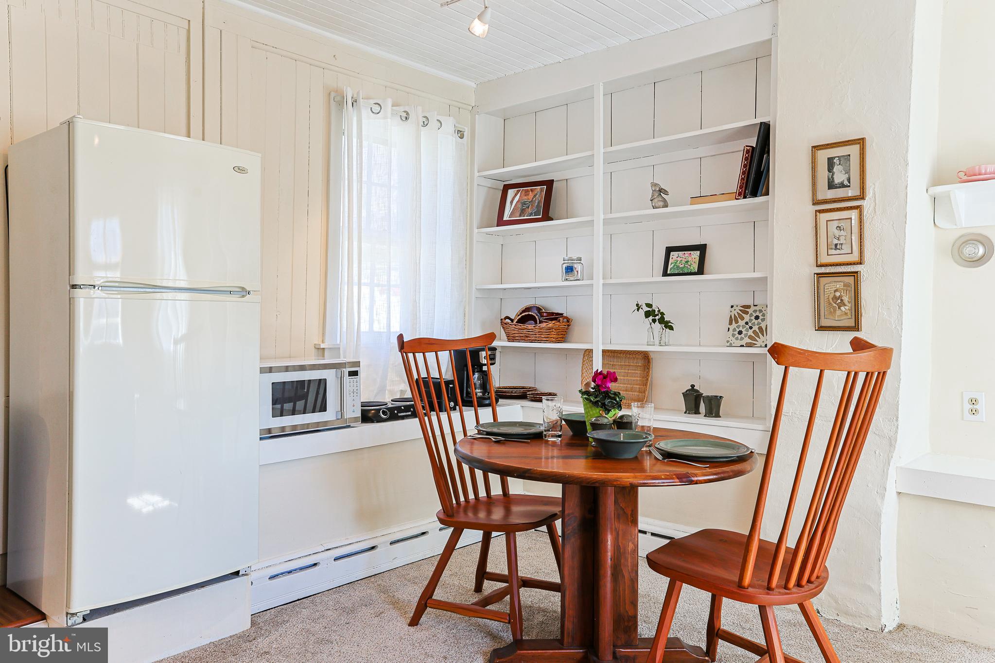 38 Devyn Drive Chester Springs, PA 19425 - Photo 33 of 40 a dining room with furniture and a refrigerator