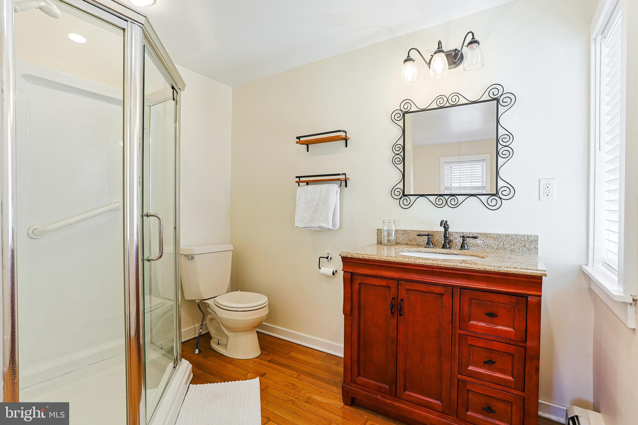 38 Devyn Drive Chester Springs, PA 19425 - Photo 36 of 40 a bathroom with a toilet sink and mirror