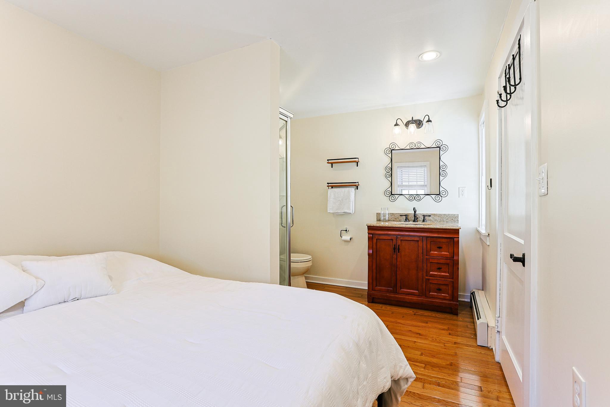 38 Devyn Drive Chester Springs, PA 19425 - Photo 37 of 40 a bedroom with a bed and a sink