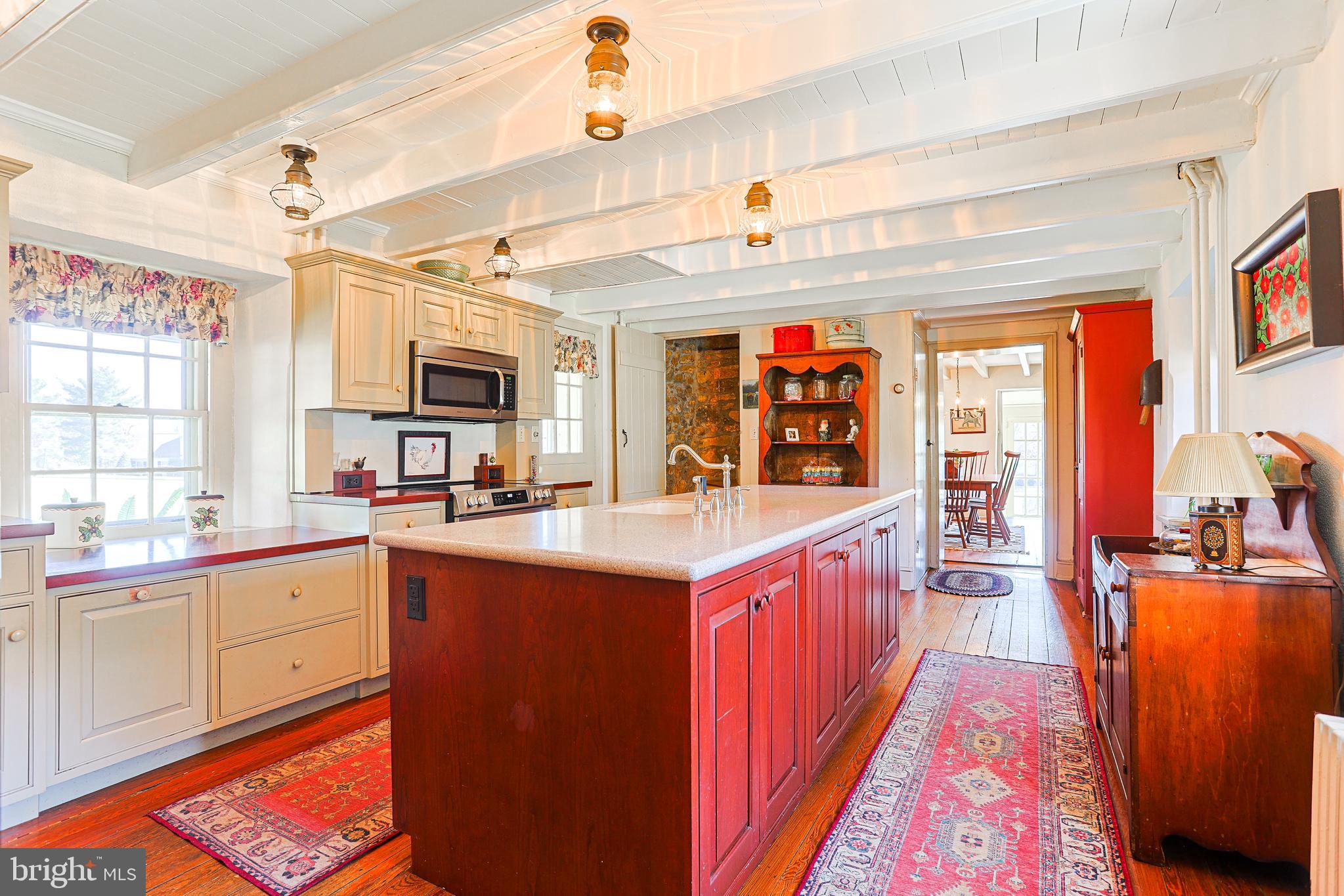 38 Devyn Drive Chester Springs, PA 19425 - Photo 4 of 40 a large kitchen with stainless steel appliances granite countertop a large stove and cabinets