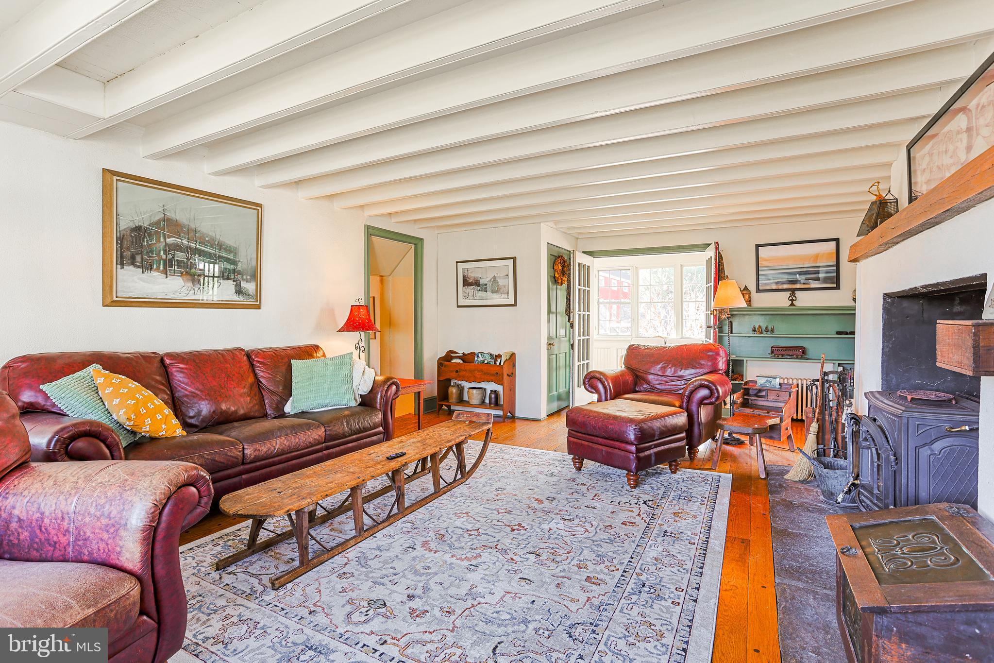 38 Devyn Drive Chester Springs, PA 19425 - Photo 6 of 40 a living room with furniture a rug and a window