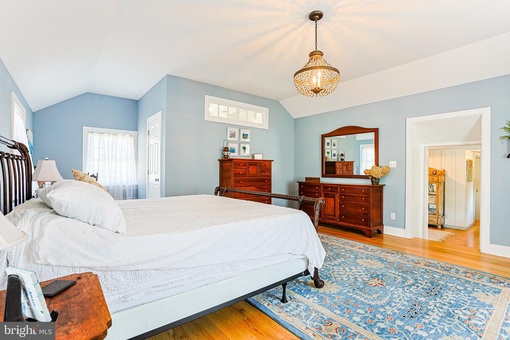 38 Devyn Drive Chester Springs, PA 19425 - Photo 10 of 40 a bedroom with a bed and a chandelier