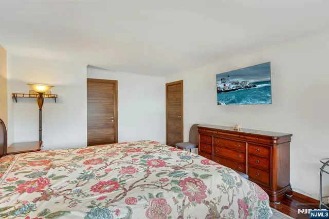 a view of a livingroom with workspace and a couch