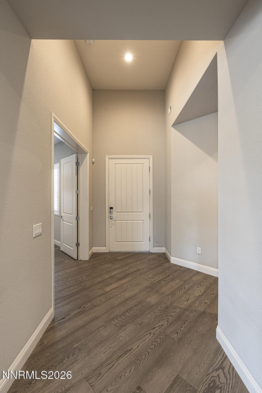 2109 Cast Iron Drive Reno, NV 89521 - Photo 21 of 35 a view of an empty room with wooden floor