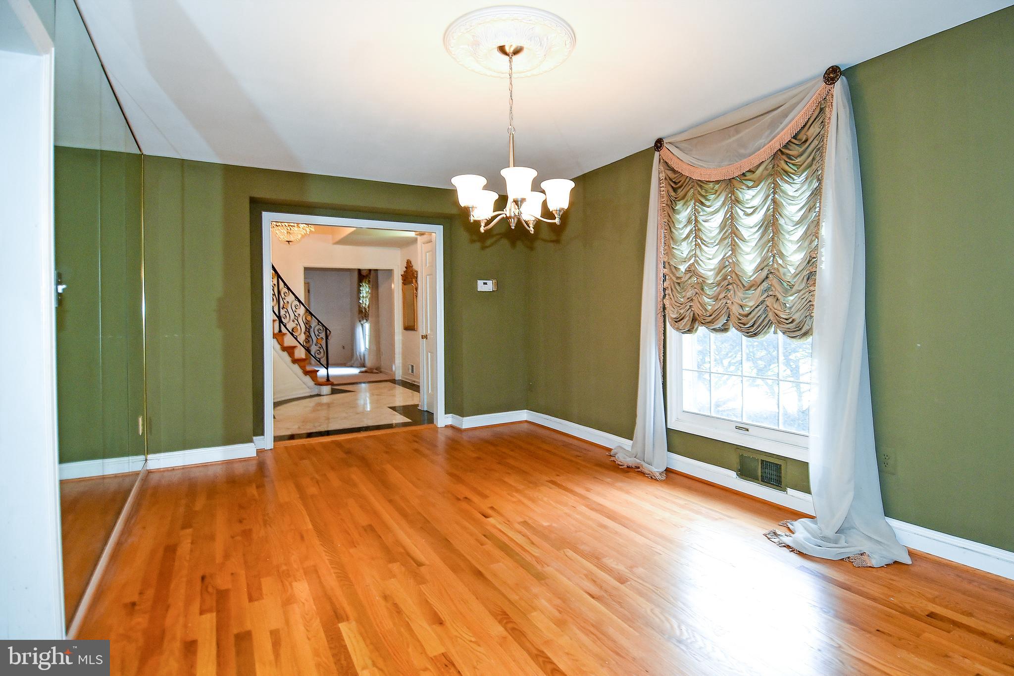 12703 Hammonton Road Silver Spring, MD 20904 - Photo 13 of 63 DINING ROOM OFF FOYER ENTRANCE