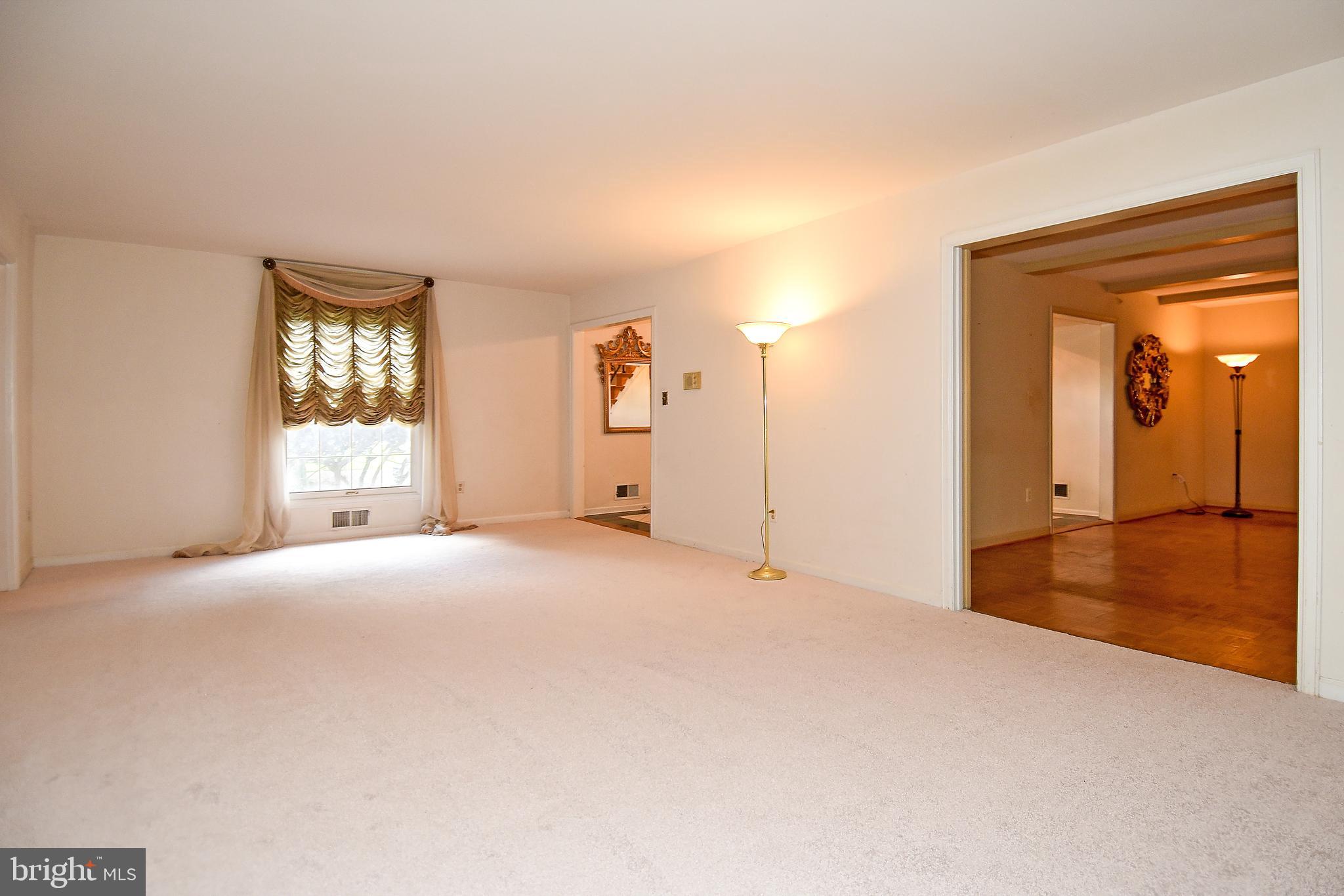 12703 Hammonton Road Silver Spring, MD 20904 - Photo 20 of 63 LIVING ROOM LARGE WINDOWS BRING IN NATURAL LIGHT