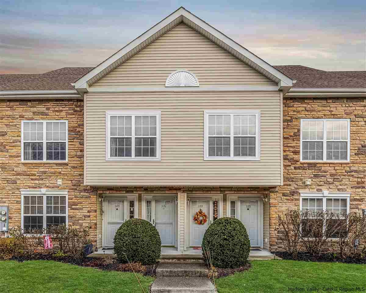 1129 Maggie Road Newburgh, NY 12550 - Photo 1 of 28 a front view of a house with garden