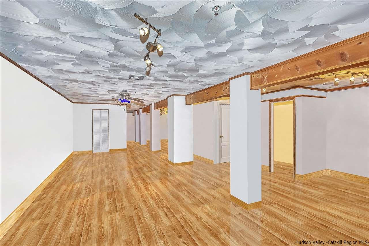 1129 Maggie Road Newburgh, NY 12550 - Photo 19 of 28 a view of empty room with wooden floor
