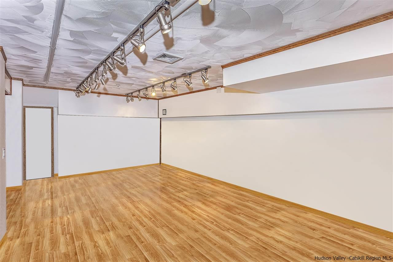 1129 Maggie Road Newburgh, NY 12550 - Photo 20 of 28 a view of a room with racks on the wall