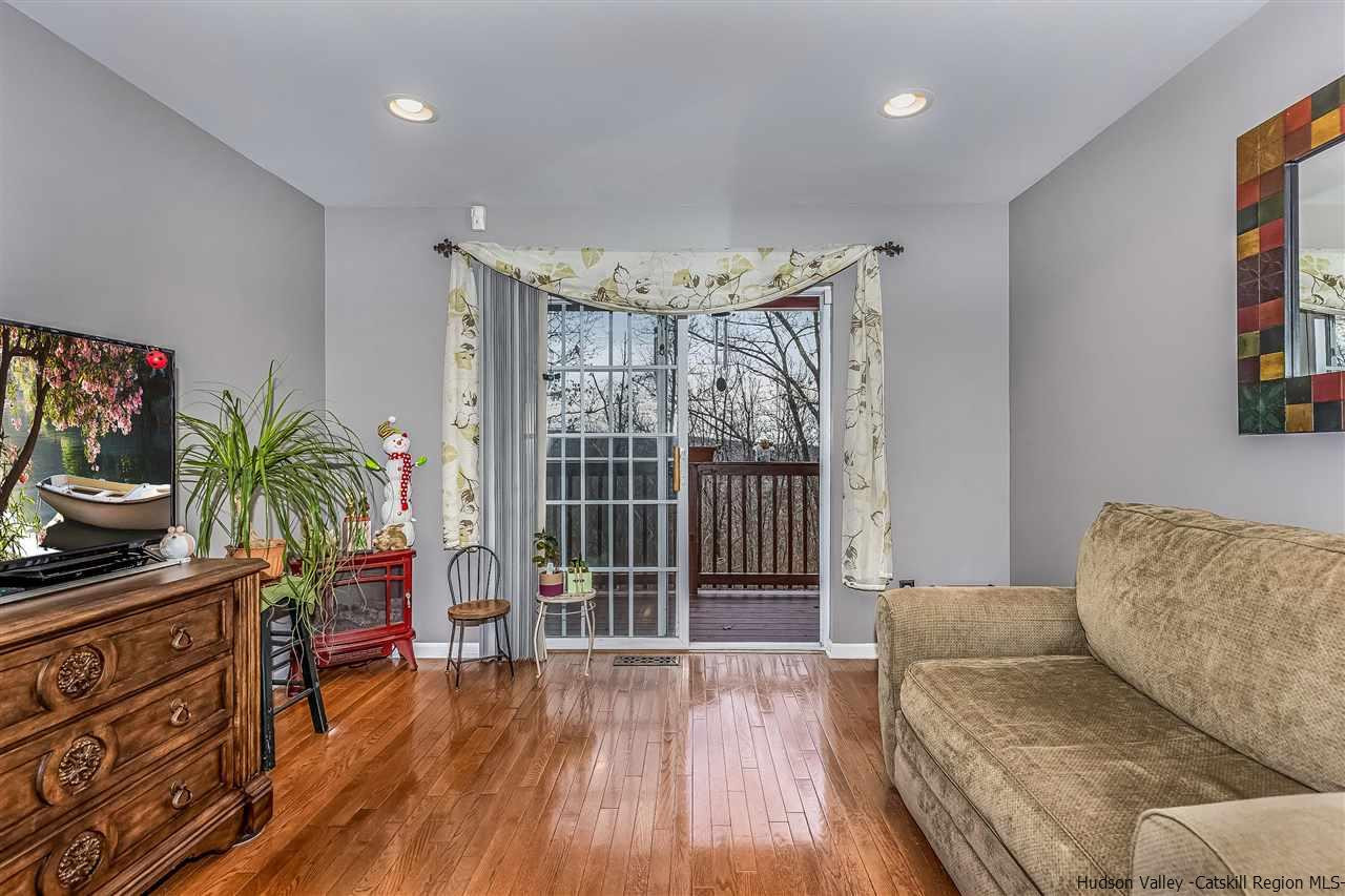 1129 Maggie Road Newburgh, NY 12550 - Photo 8 of 28 a living room with furniture and a flat screen tv