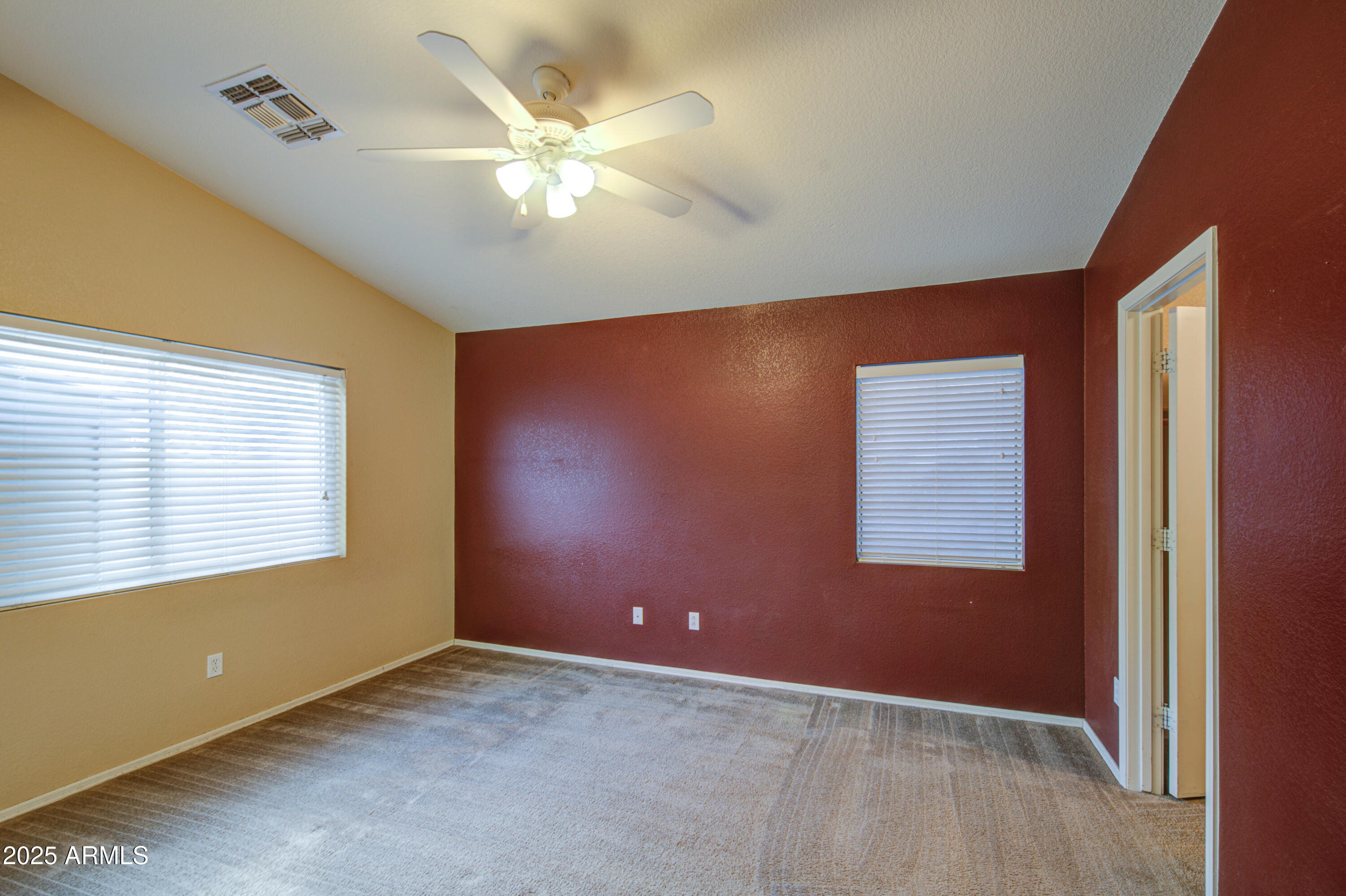 11465 East Cicero Street Mesa, AZ 85207 - Photo 16 of 36 a view of an empty room with a window