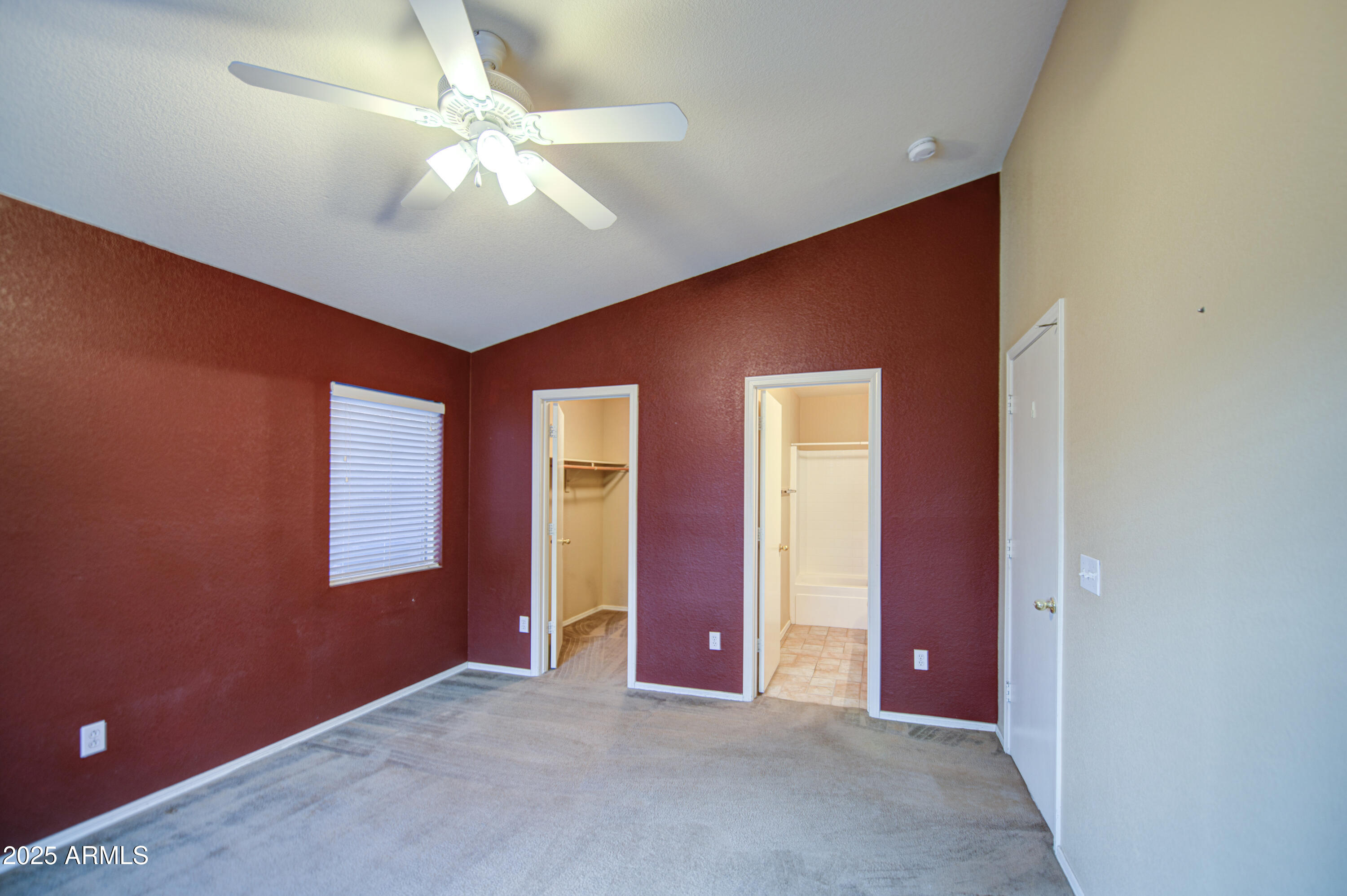 11465 East Cicero Street Mesa, AZ 85207 - Photo 17 of 36 an empty room with windows and closet